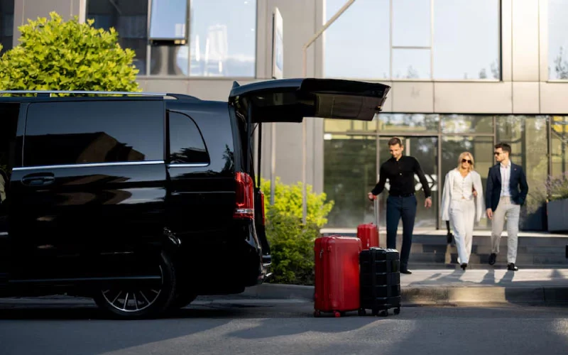A modern RideVoova coach arriving at an event venue during an emergency call-out in London.